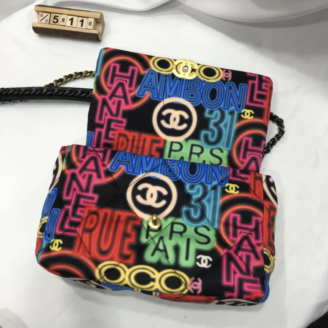 Designer bags by Chanel 195