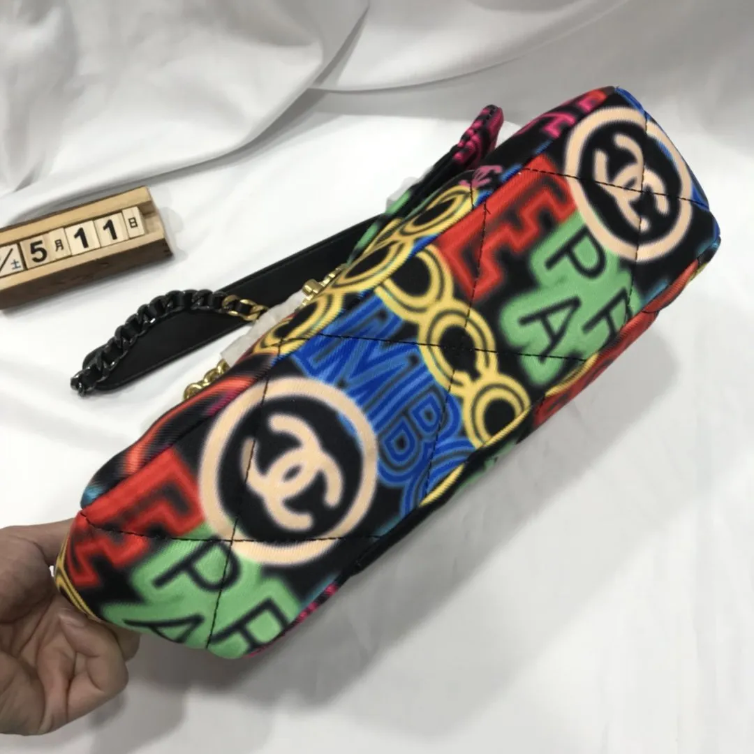Designer bags by Chanel 195