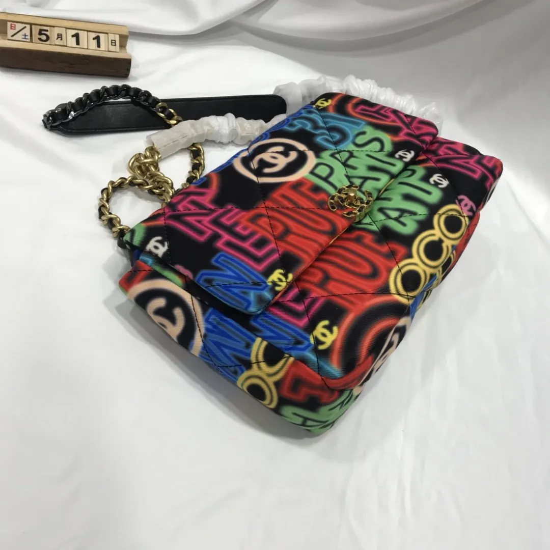 Designer bags by Chanel 195