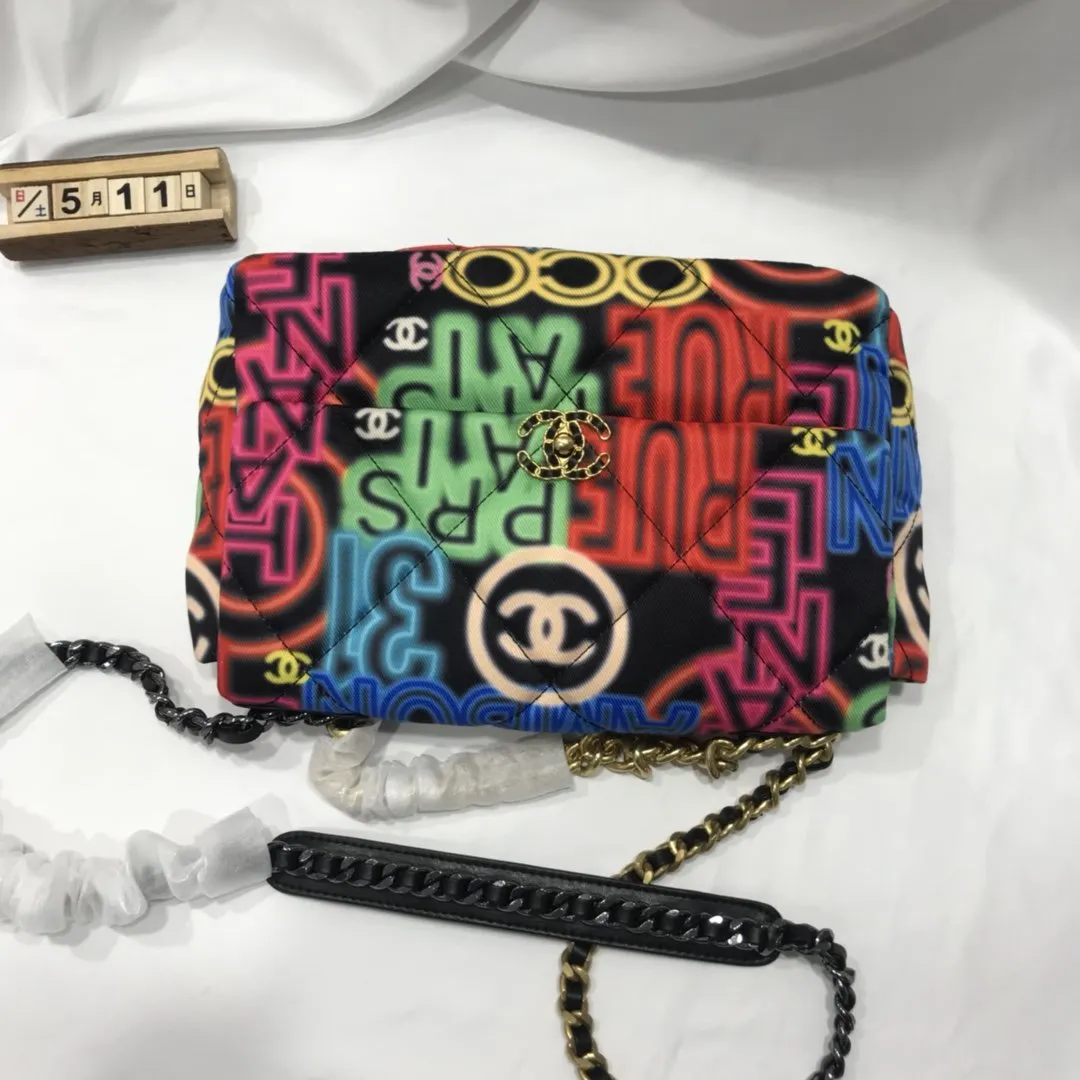 Designer bags by Chanel 195