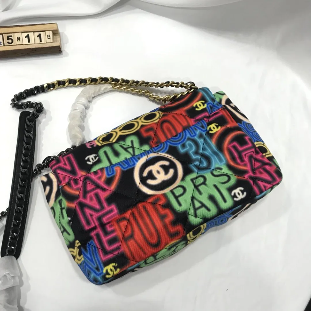 Designer bags by Chanel 195