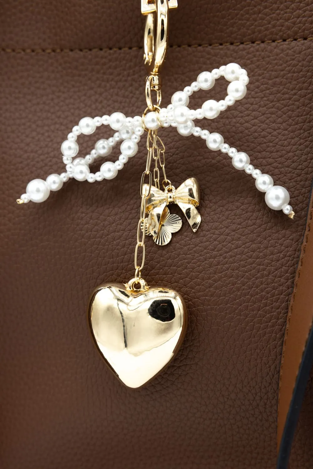 Pearl Bow Heart Purse Charm in Gold | NCA056-GDDRM