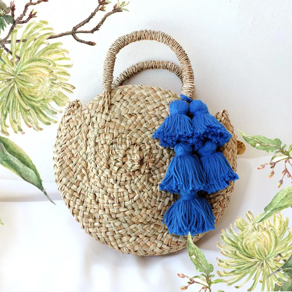 PETITE LUNA BAG- ROUND STRAW TOTE BAG WITH ROYAL BLUE TASSEL