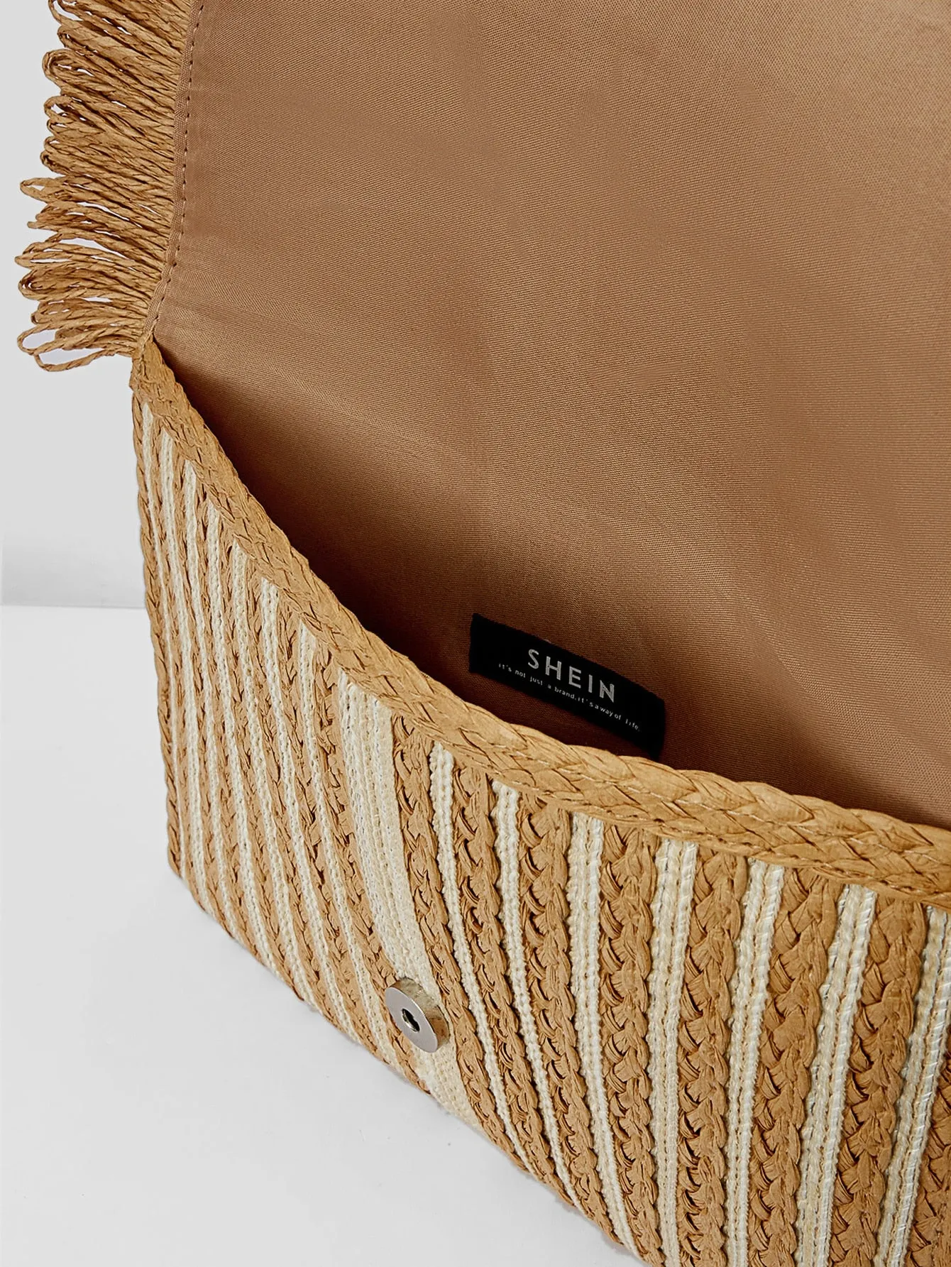 Woven Teen Vector Clutch Bag